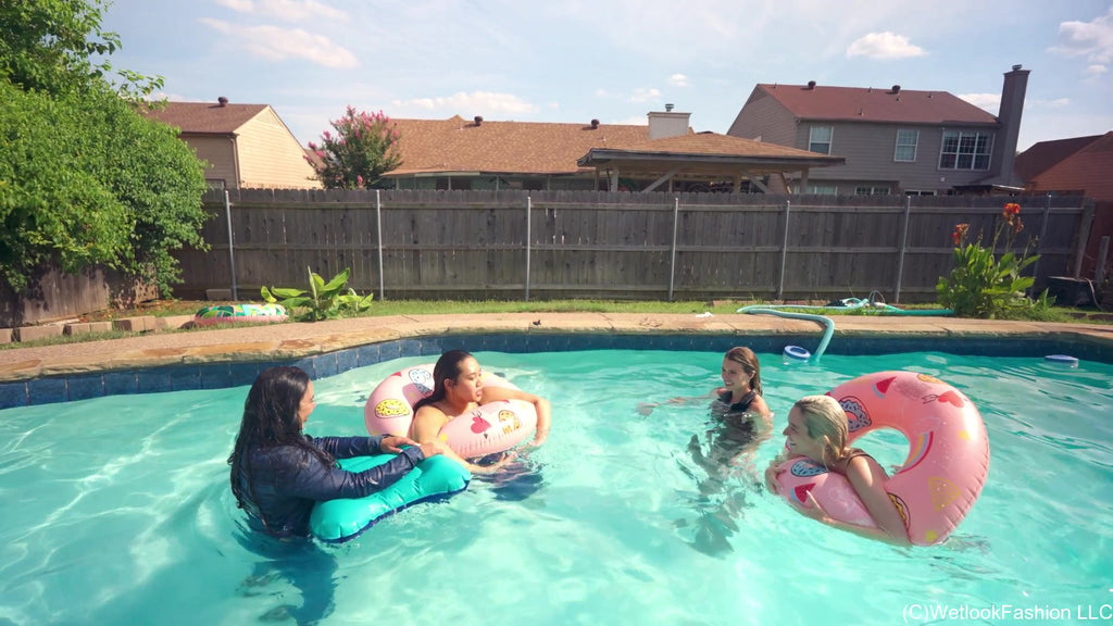 4 Girls Are Having Fun in the Pool Fully Clothed