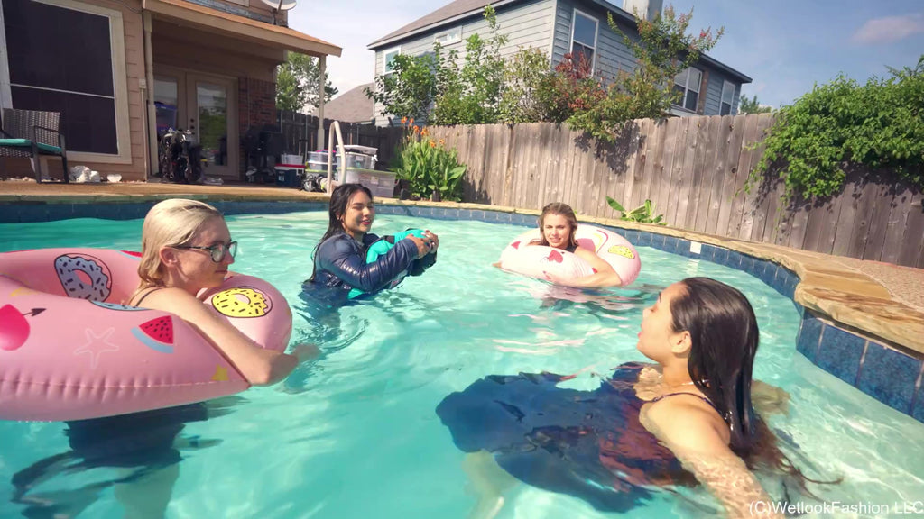 4 Girls Are Having Fun in the Pool Fully Clothed