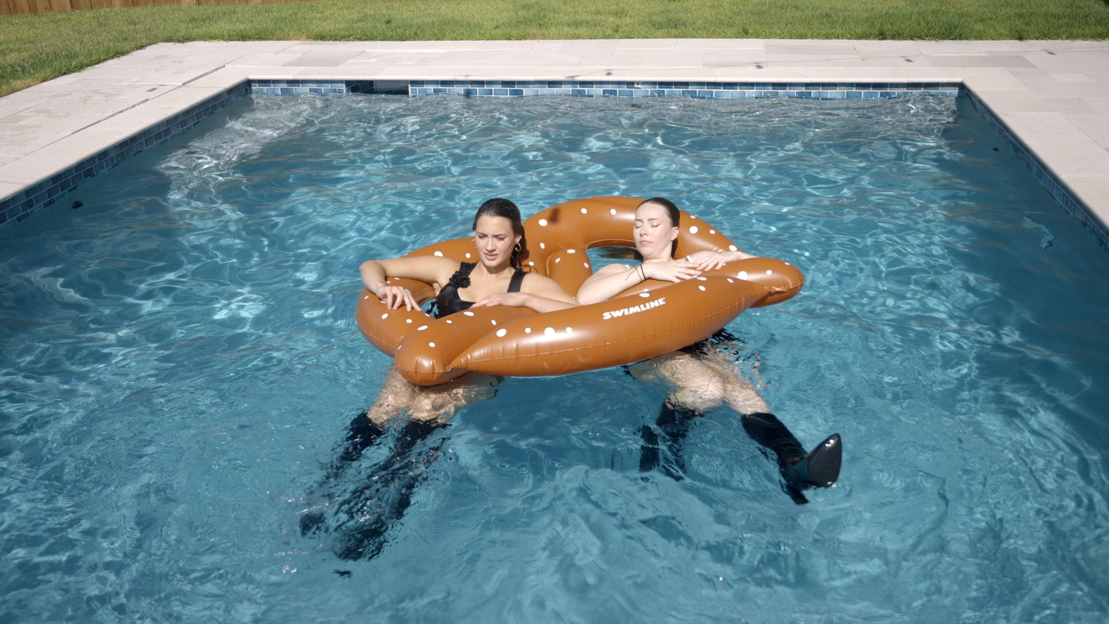Taylor and Ella Having Fun in the Pool all Dressed Up