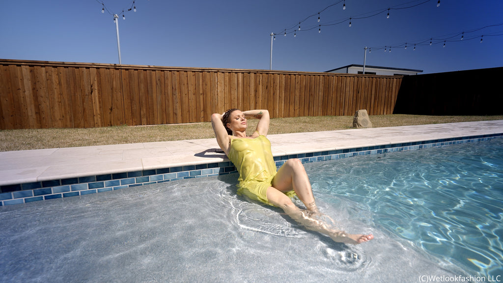 Presley takes a Swim in a Yellow Satin Dress