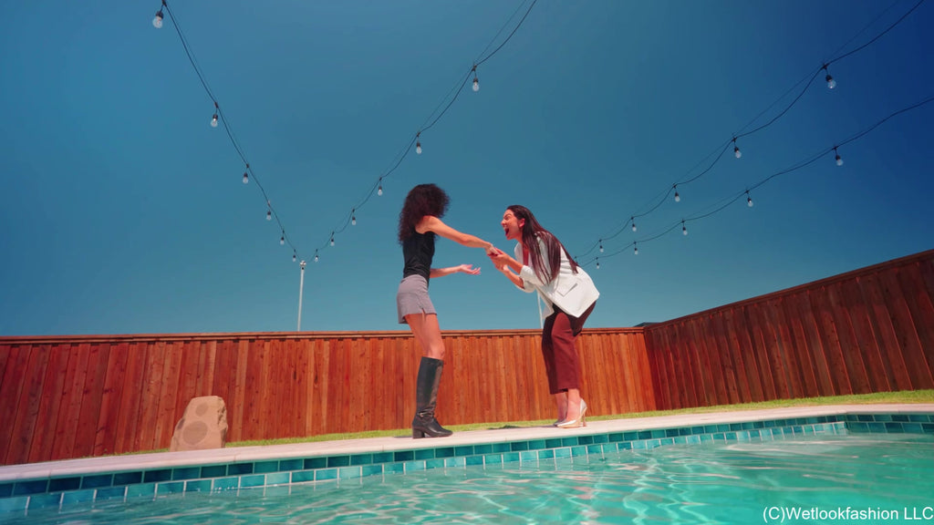 Alexandra and Carla Pushed in the Pool