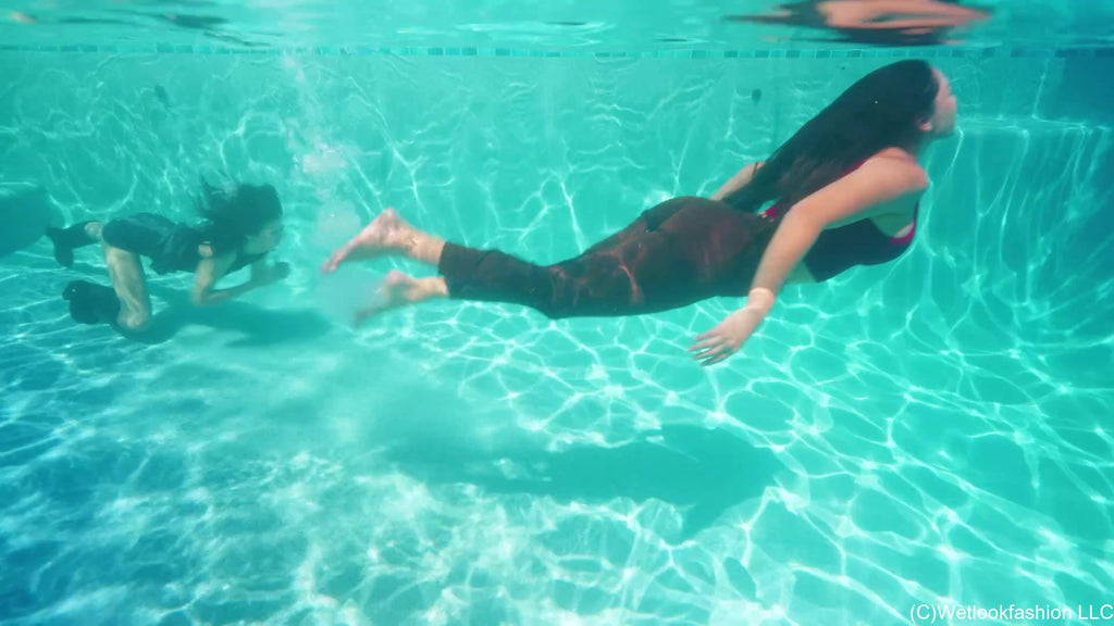 Alexandra and Carla Pushed in the Pool