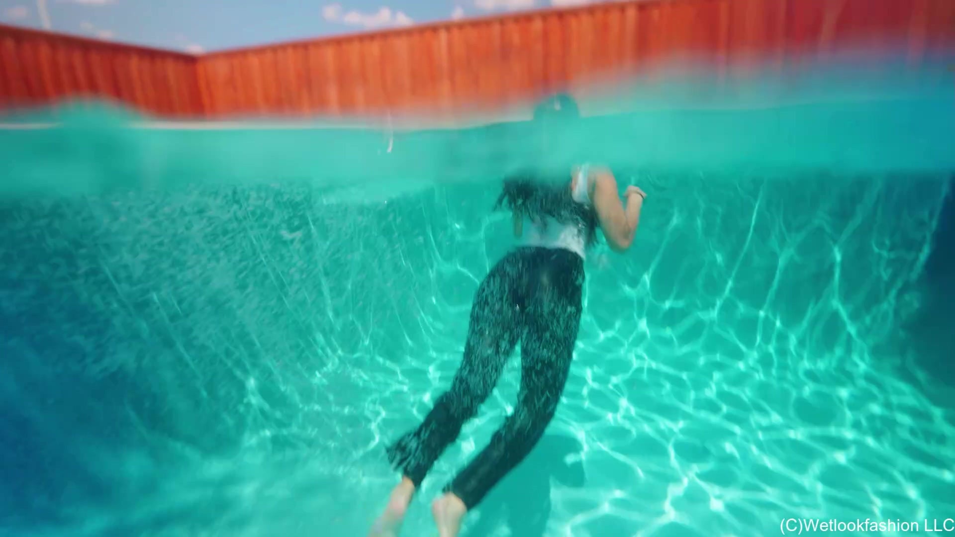 Alexandra Dives in the Pool in Hot Leather Pants