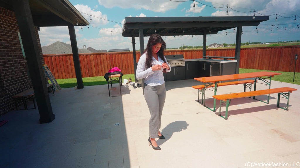 Alexandra Swims in a White and Grey Business Outfit