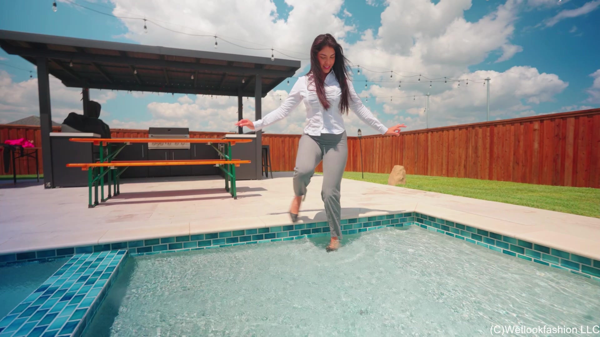 Alexandra Swims in a White and Grey Business Outfit