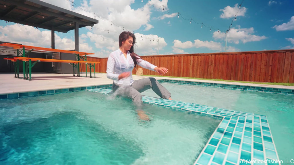 Alexandra Swims in a White and Grey Business Outfit