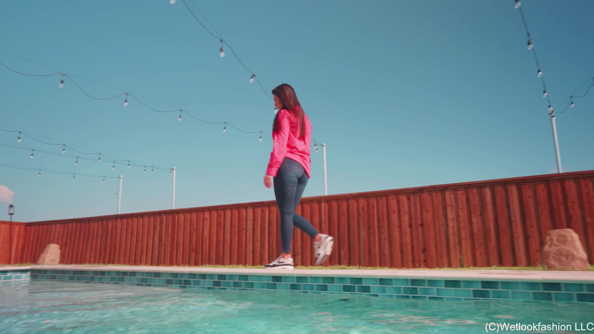 Alexandra Swims in Jeans, Sneakers, and a Button Up Shirt