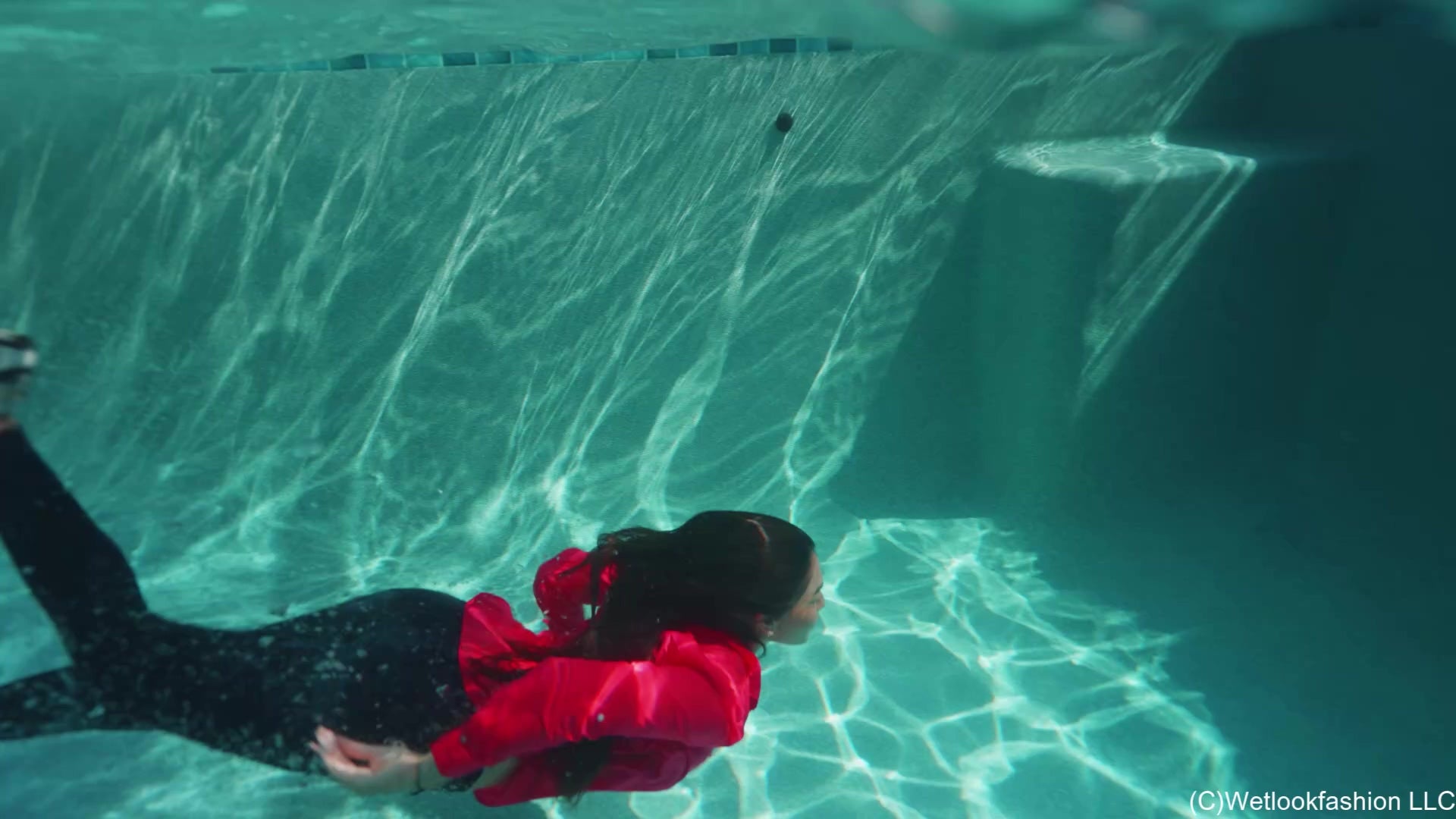 Alexandra Swims in Jeans, Sneakers, and a Button Up Shirt