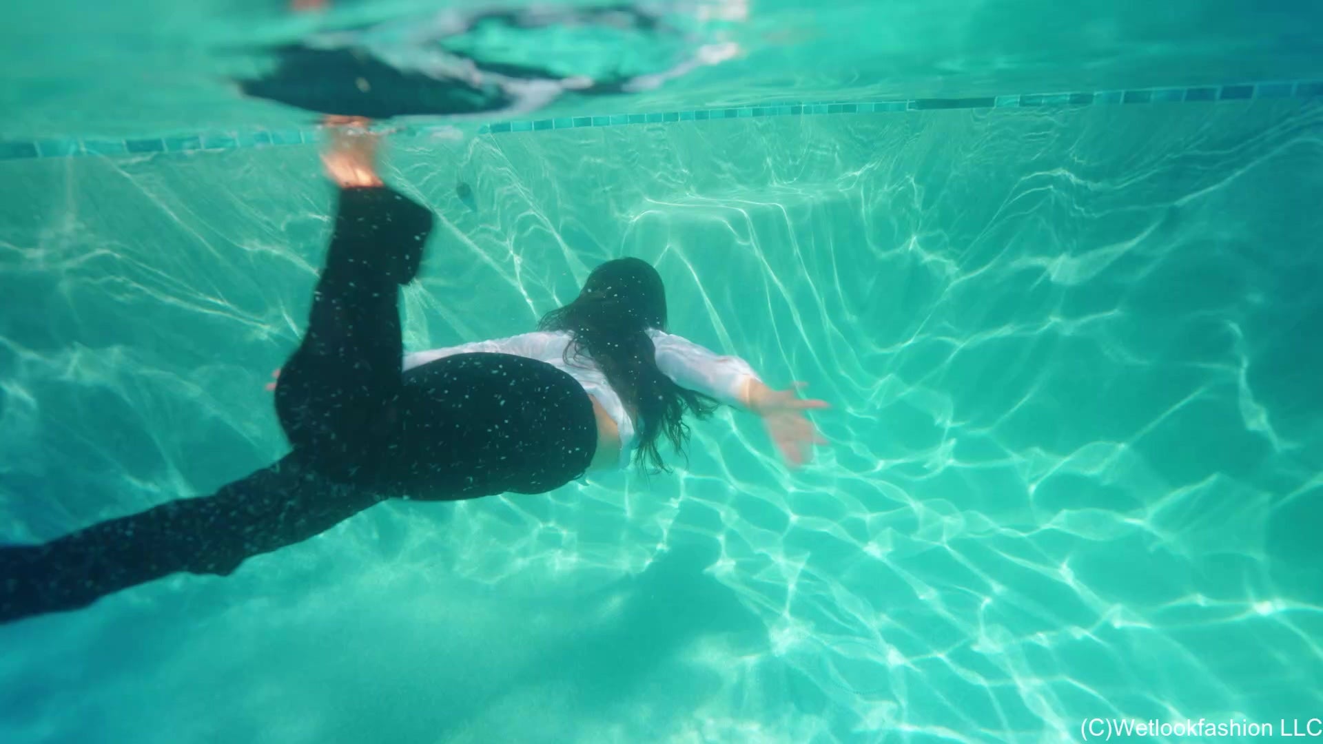 Alexandra Is Dared to Swim Fully Clothed