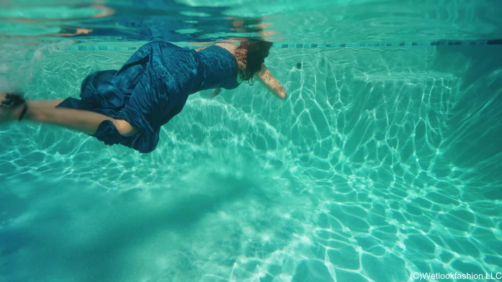 Alexandra Swims in Her Blue Bridesmaid Dress