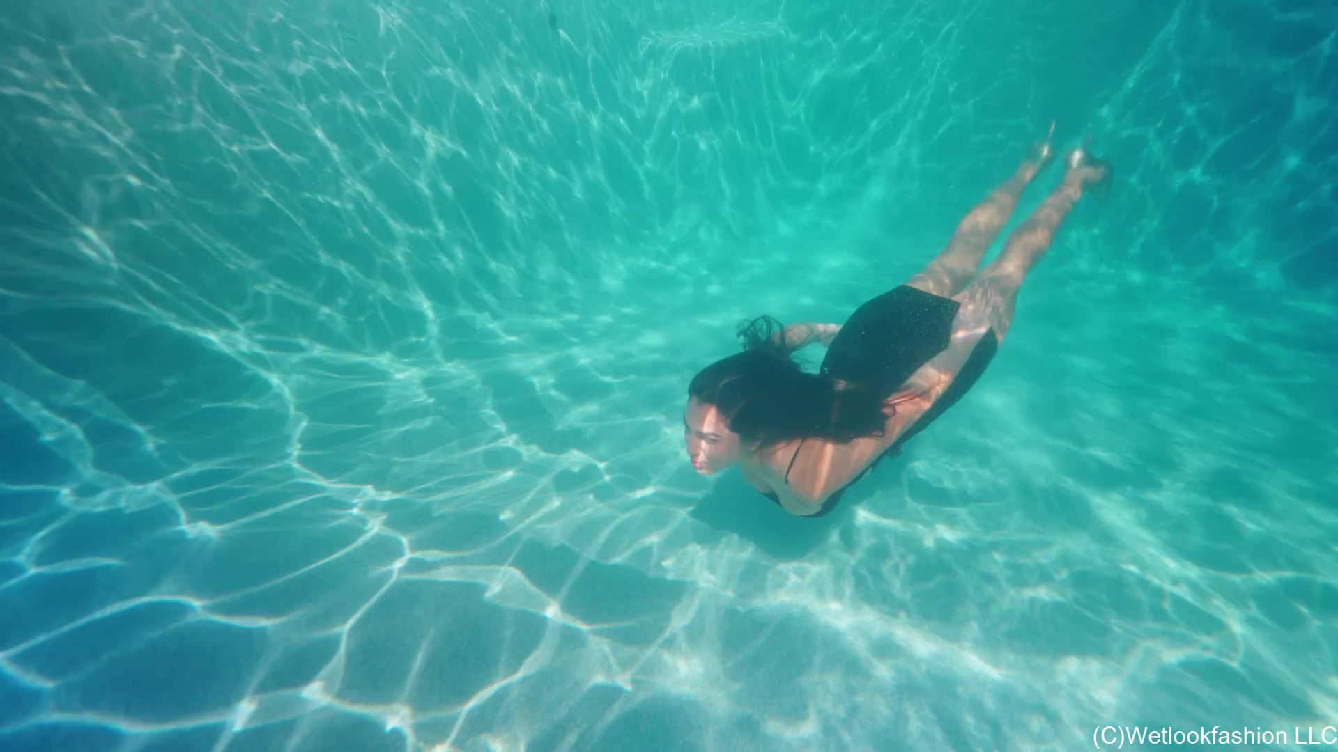 Alexandra Takes a Pool Dip in a Minidress
