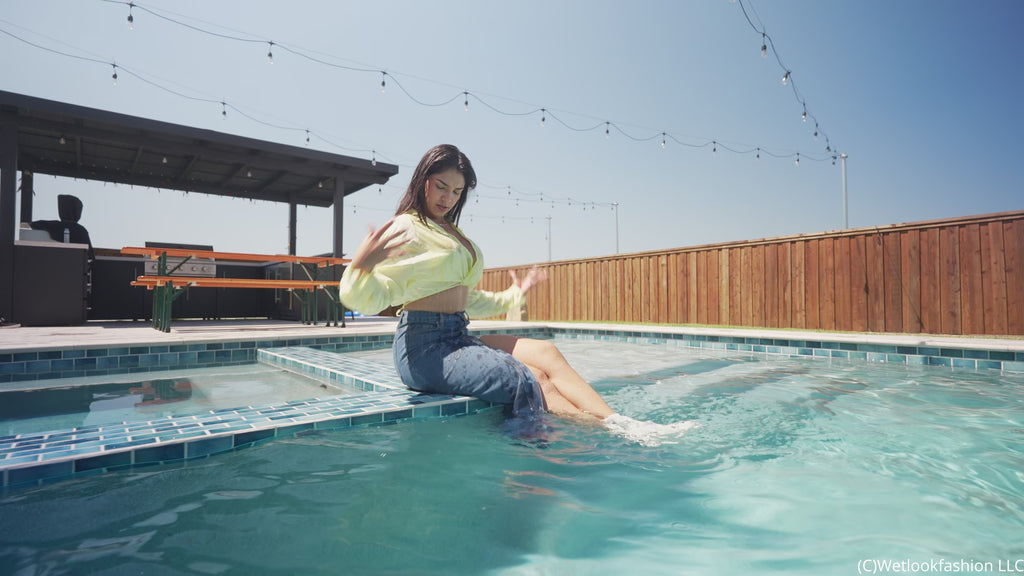 Alexandra Takes a Dip Wearing a Jean Skirt, Top and Boots