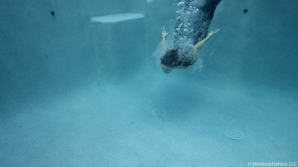 Alix Takes Her First Ever Fully Clothed Swim in a Gown