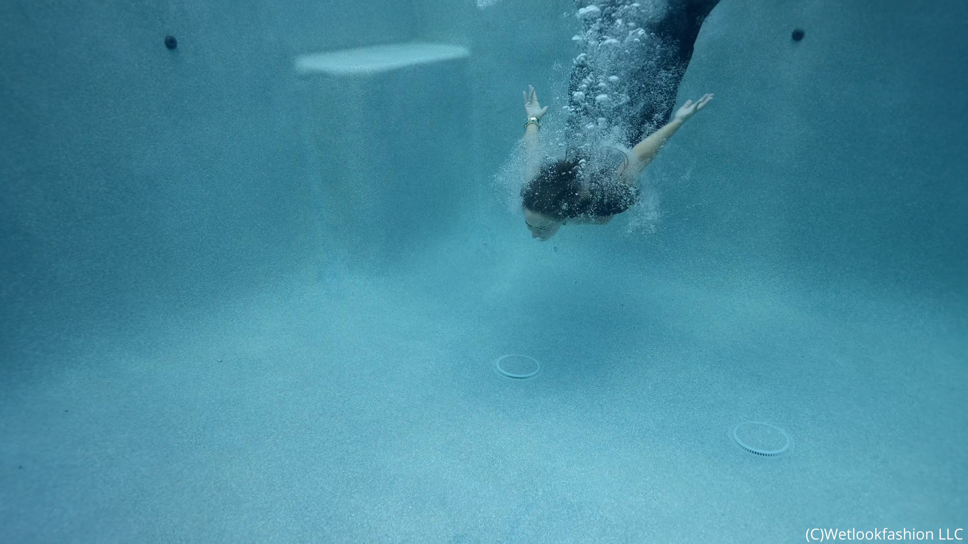 Alix Takes Her First Ever Fully Clothed Swim in a Gown
