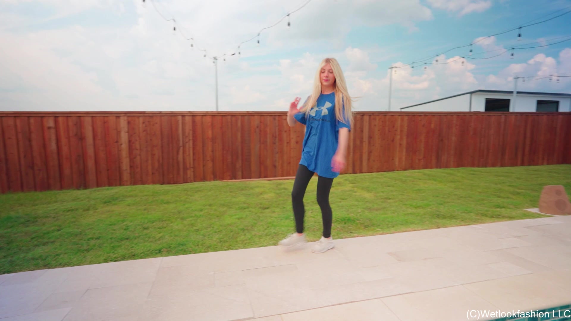 Amber Goes for a Swim in Leggings, T-Shirt and Sneakers