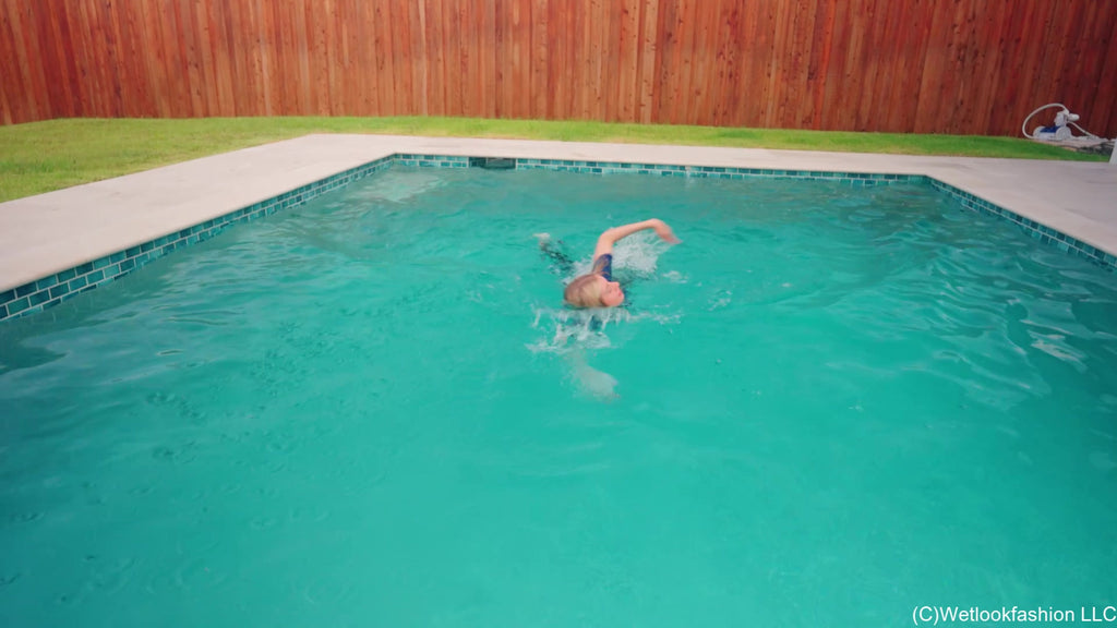 Amber Goes for a Swim in Leggings, T-Shirt and Sneakers