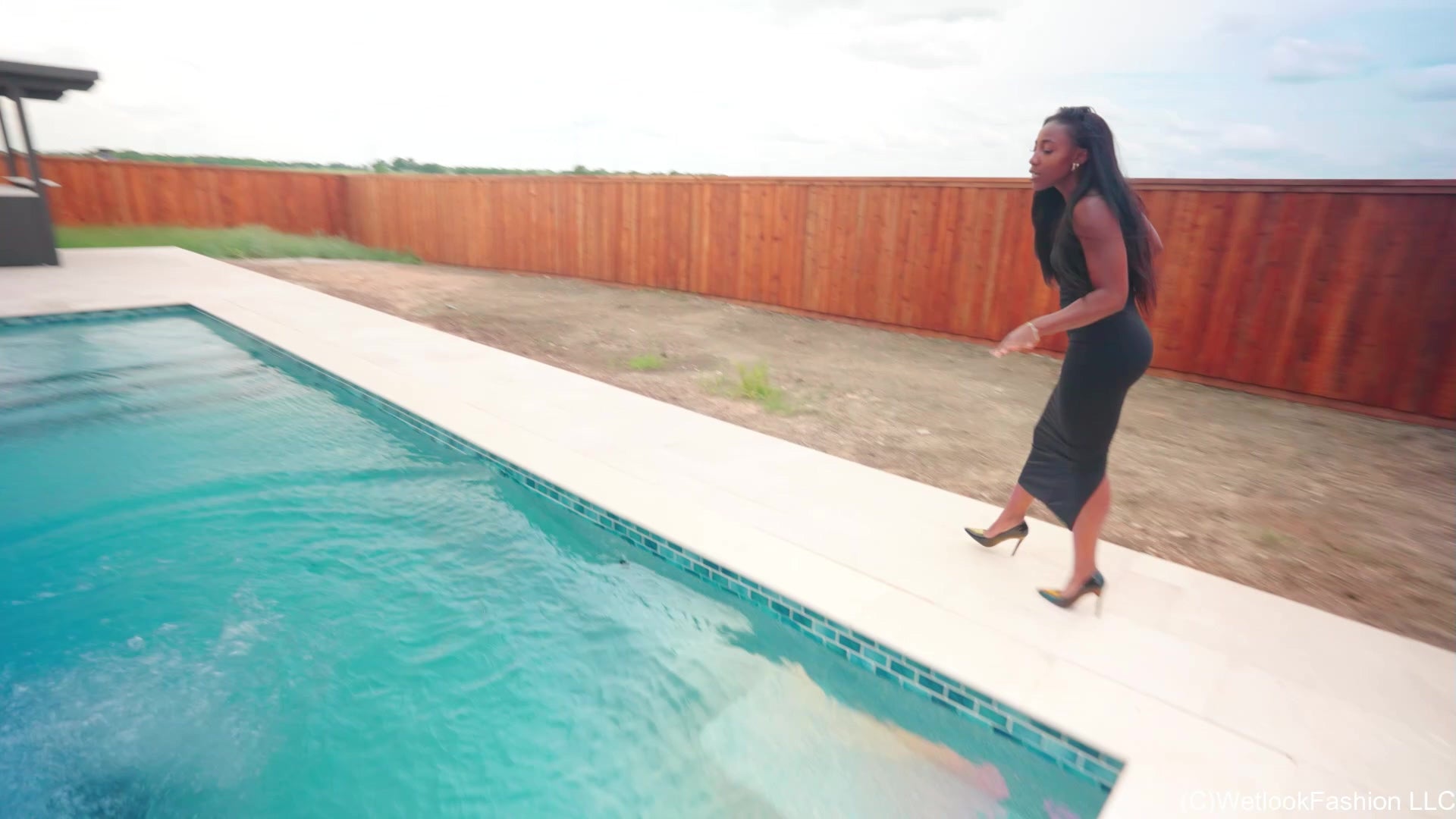 Amy and Naomi Are Having a Friendly Water Fight