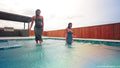 Amy and Naomi Are Having a Friendly Water Fight