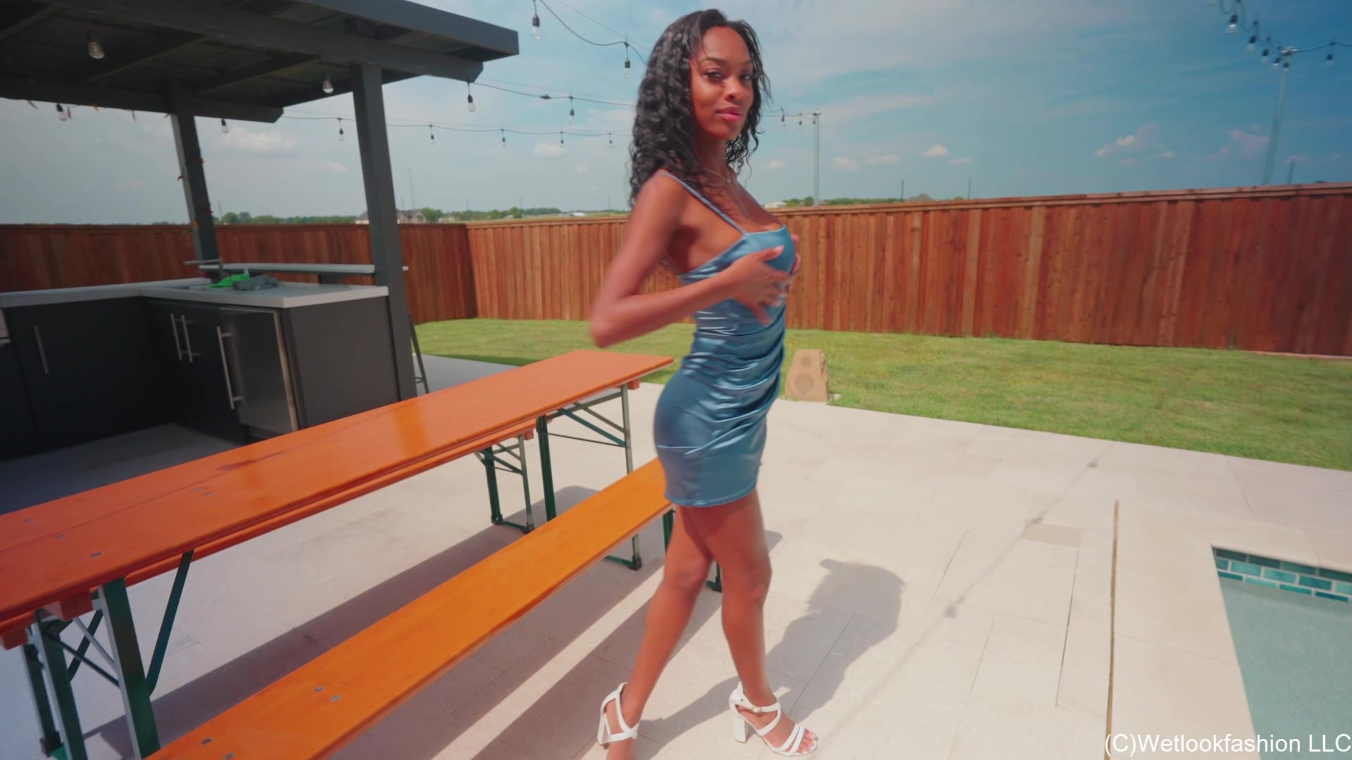 Amy Enjoys a Pool Dip in a Shiny Satin Dress