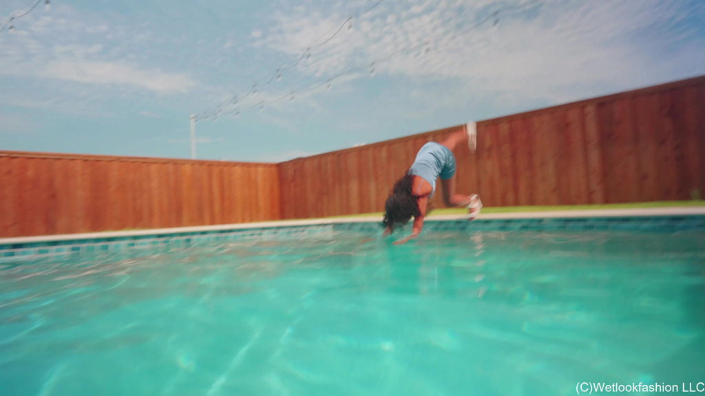 Amy Enjoys a Pool Dip in a Shiny Satin Dress