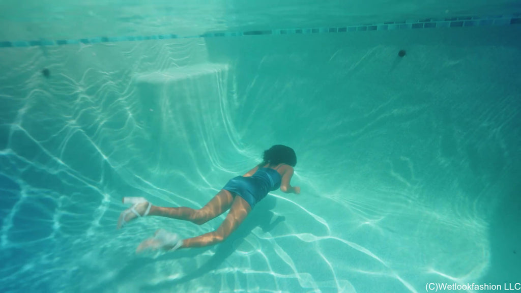 Amy Enjoys a Pool Dip in a Shiny Satin Dress