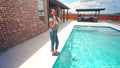 Amy Is Hiding in the Pool All Dressed Up