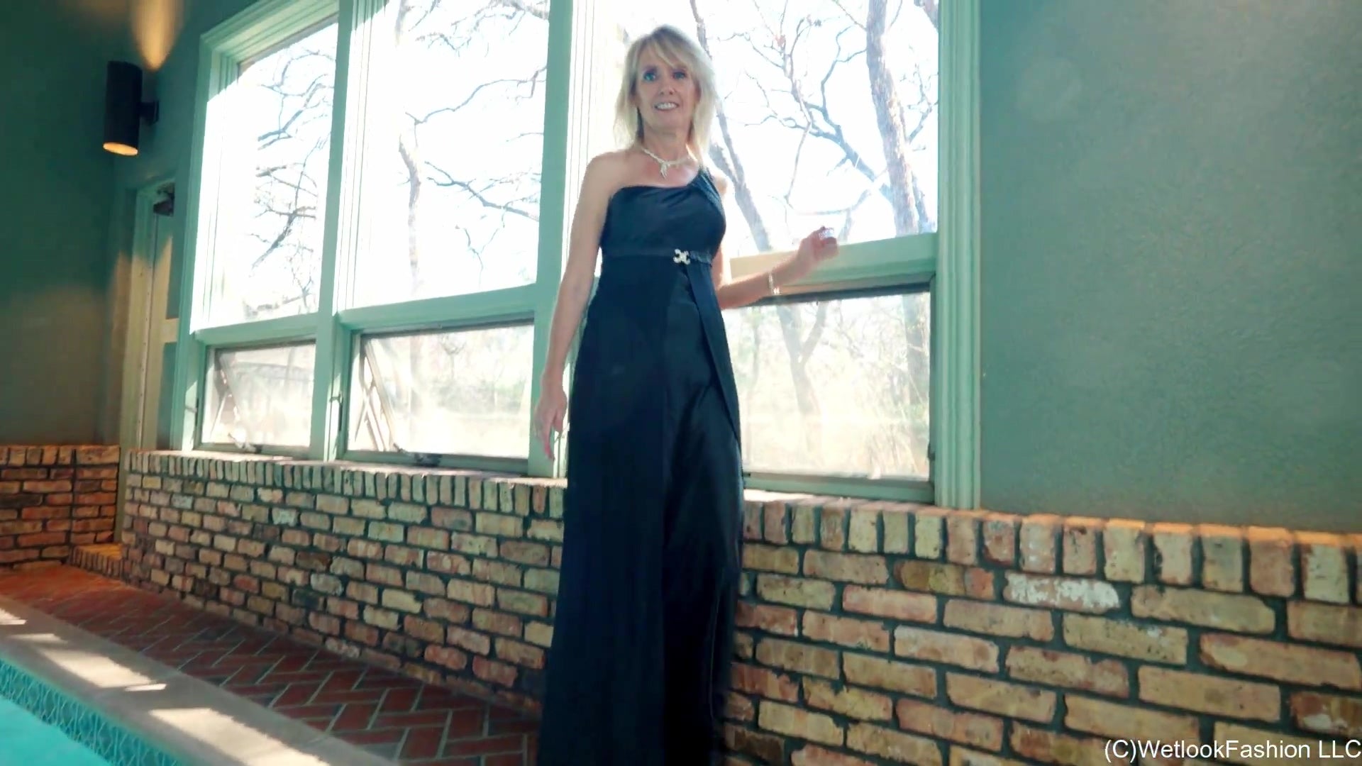 Angel Swimming in a Shiny Black Evening Gown