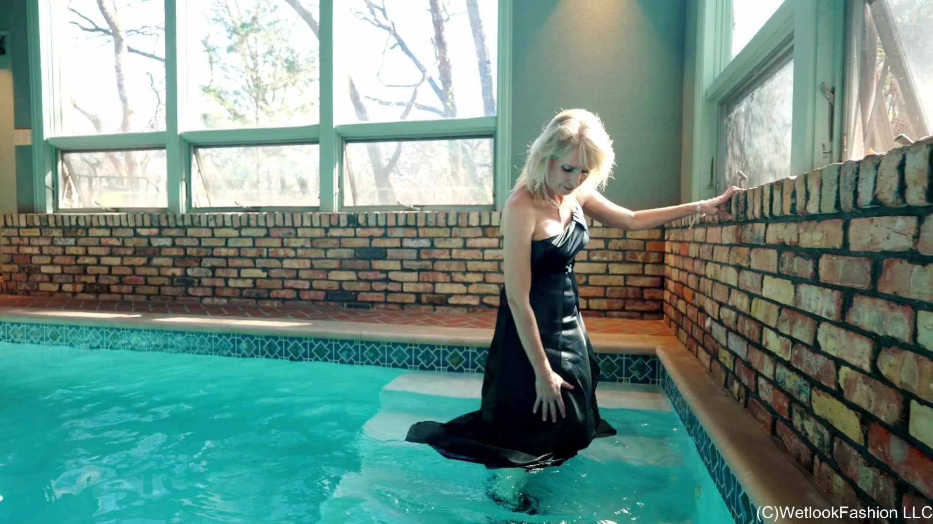 Angel Swimming in a Shiny Black Evening Gown