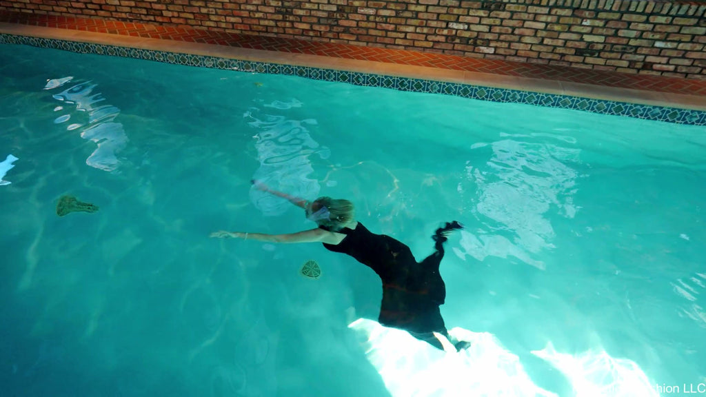 Angel Swimming in a Shiny Black Evening Gown