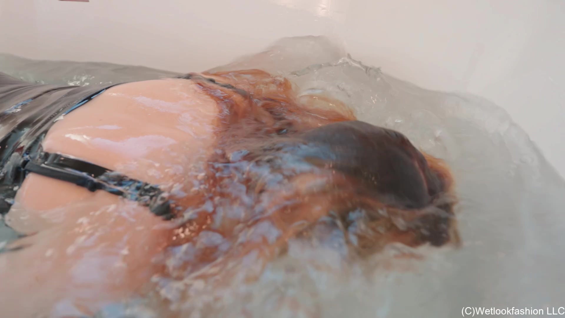 Ariel Gets Wet in a Little Black Dress and Heels