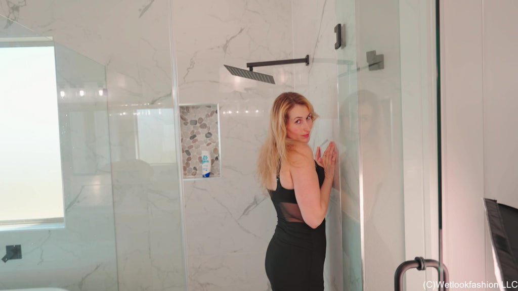 Ariel Gets Wet in a Little Black Dress and Heels