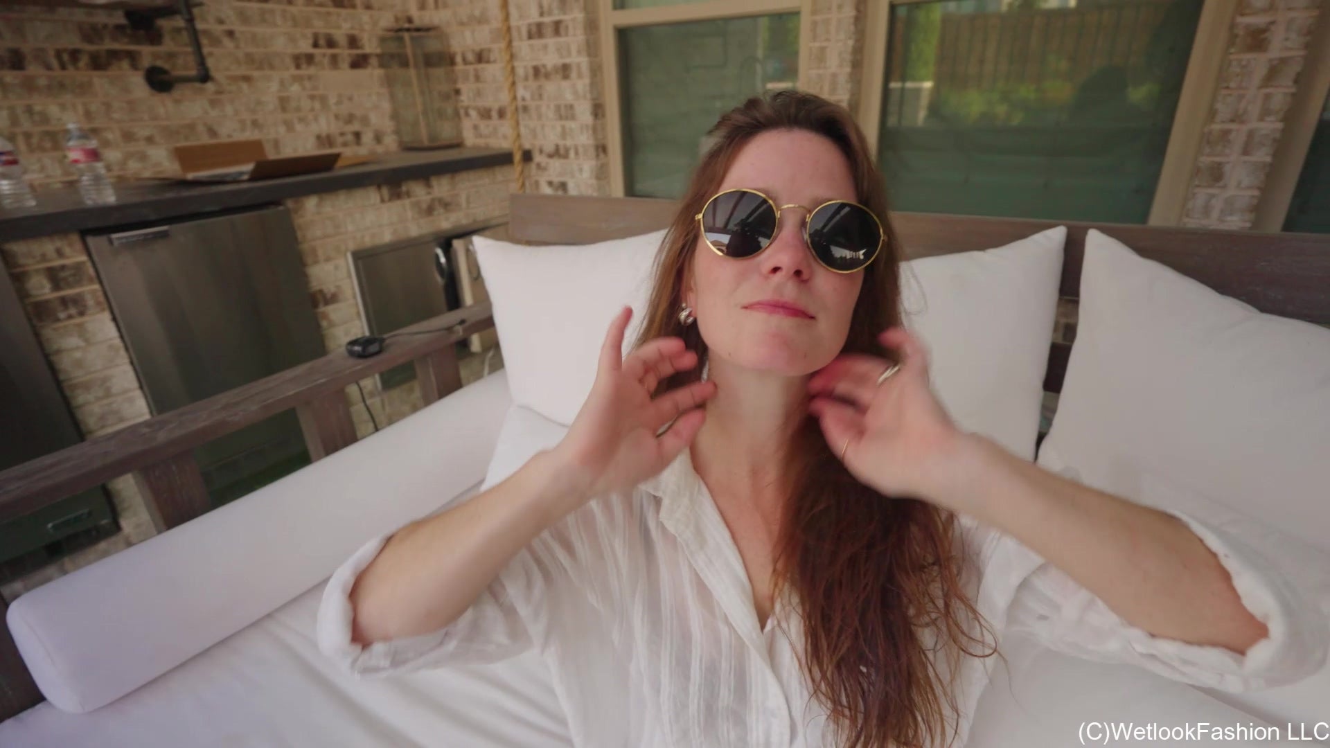 Rey Swims in Jeans, a Shirt and Barefoot