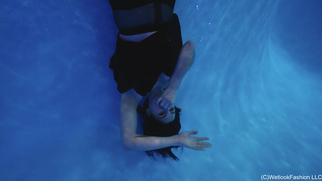 Bella Goes for a Swim in a Mini Dress and Tights