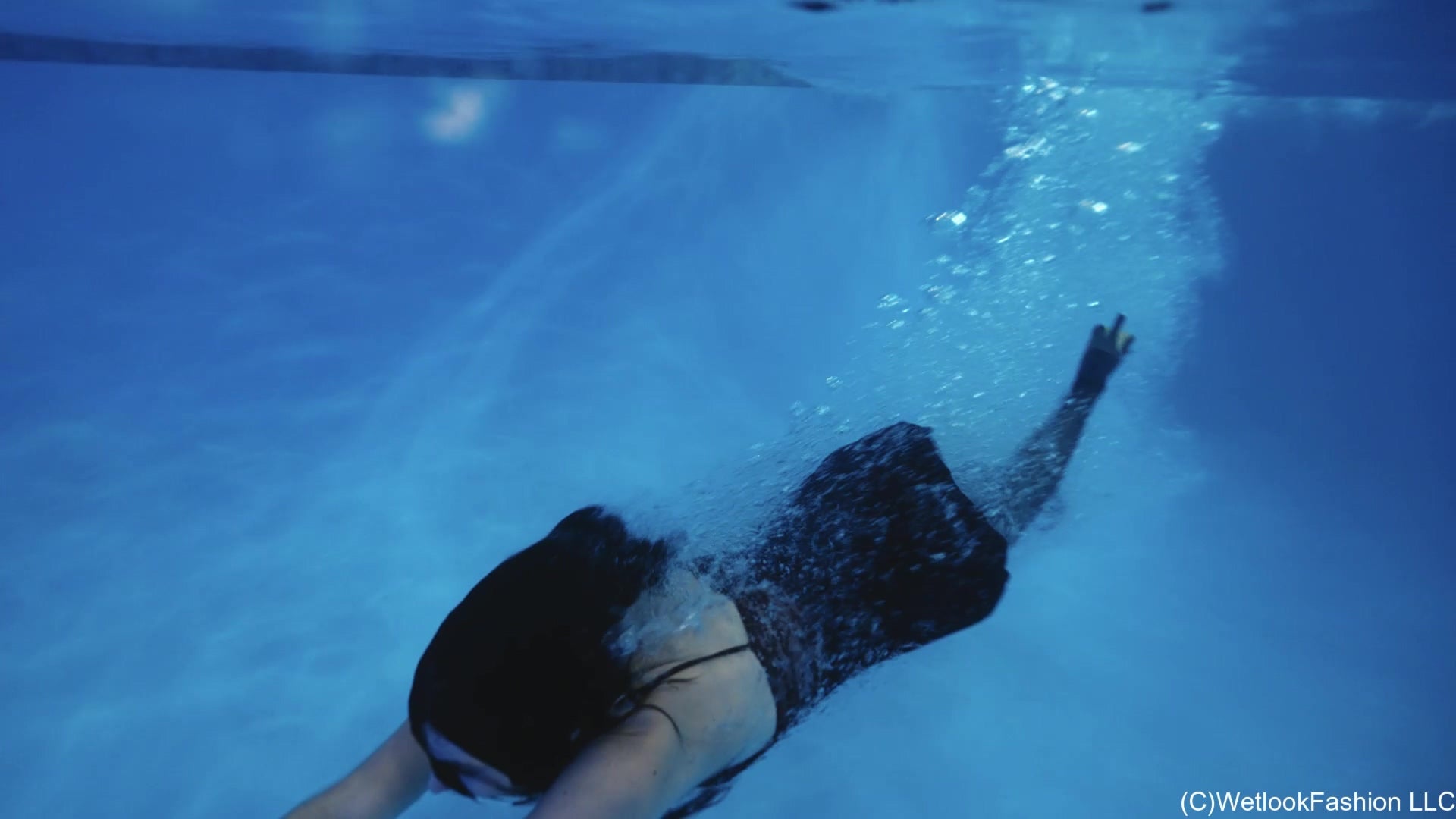 Bella Goes for a Swim in a Mini Dress and Tights