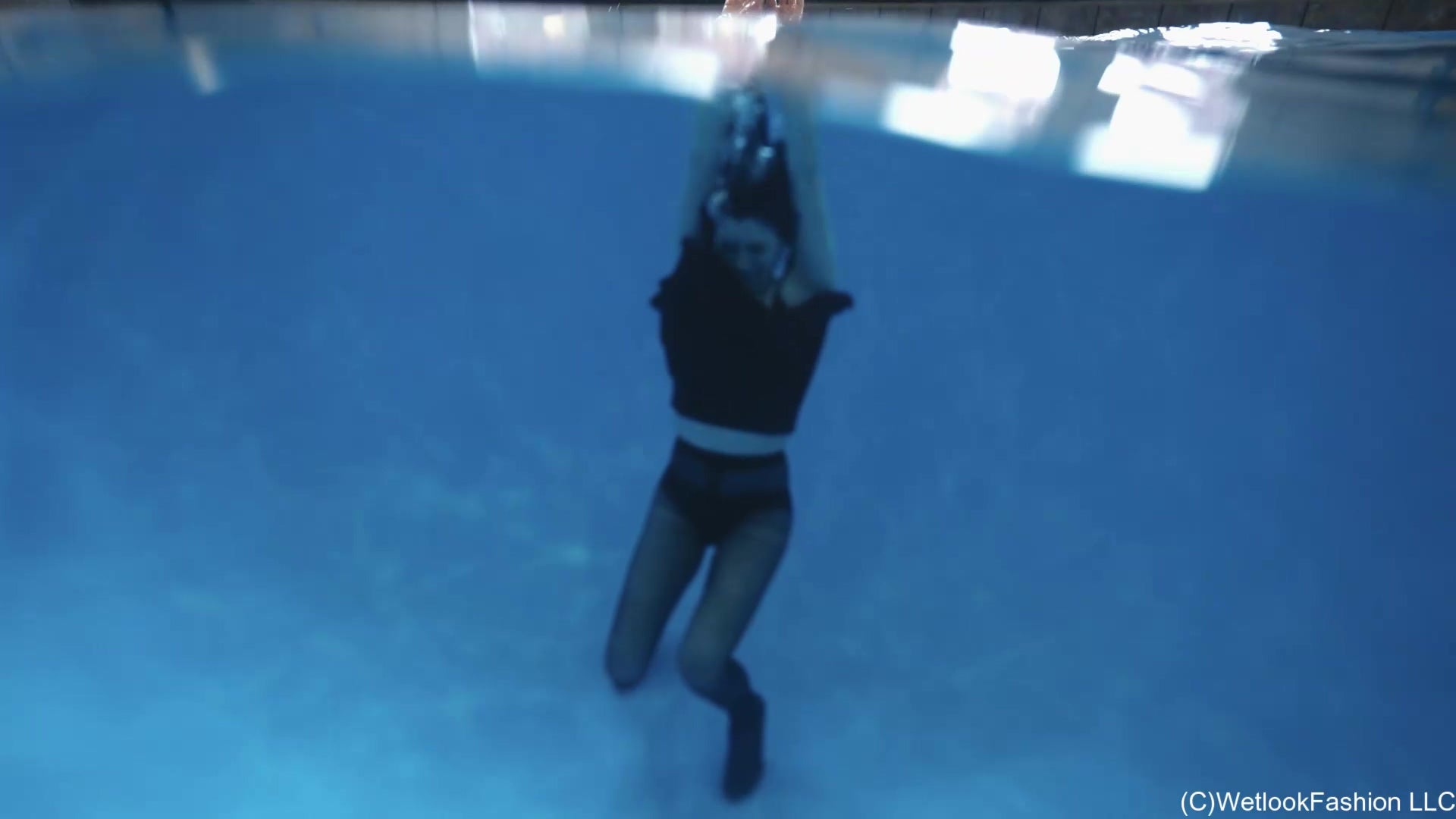 Bella Goes for a Swim in a Mini Dress and Tights