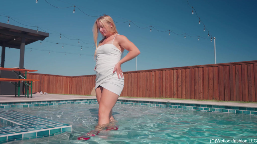 Brinley Swims in White