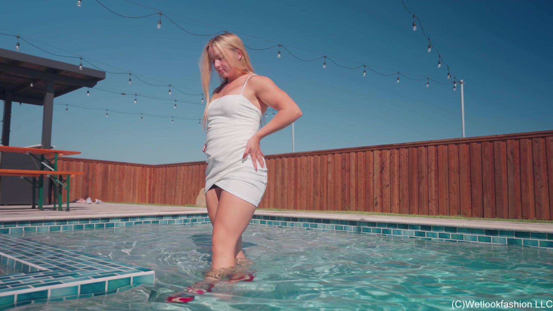 Brinley Swims in White