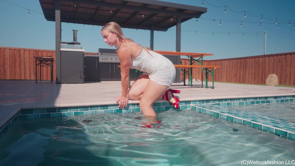 Brinley Swims in White