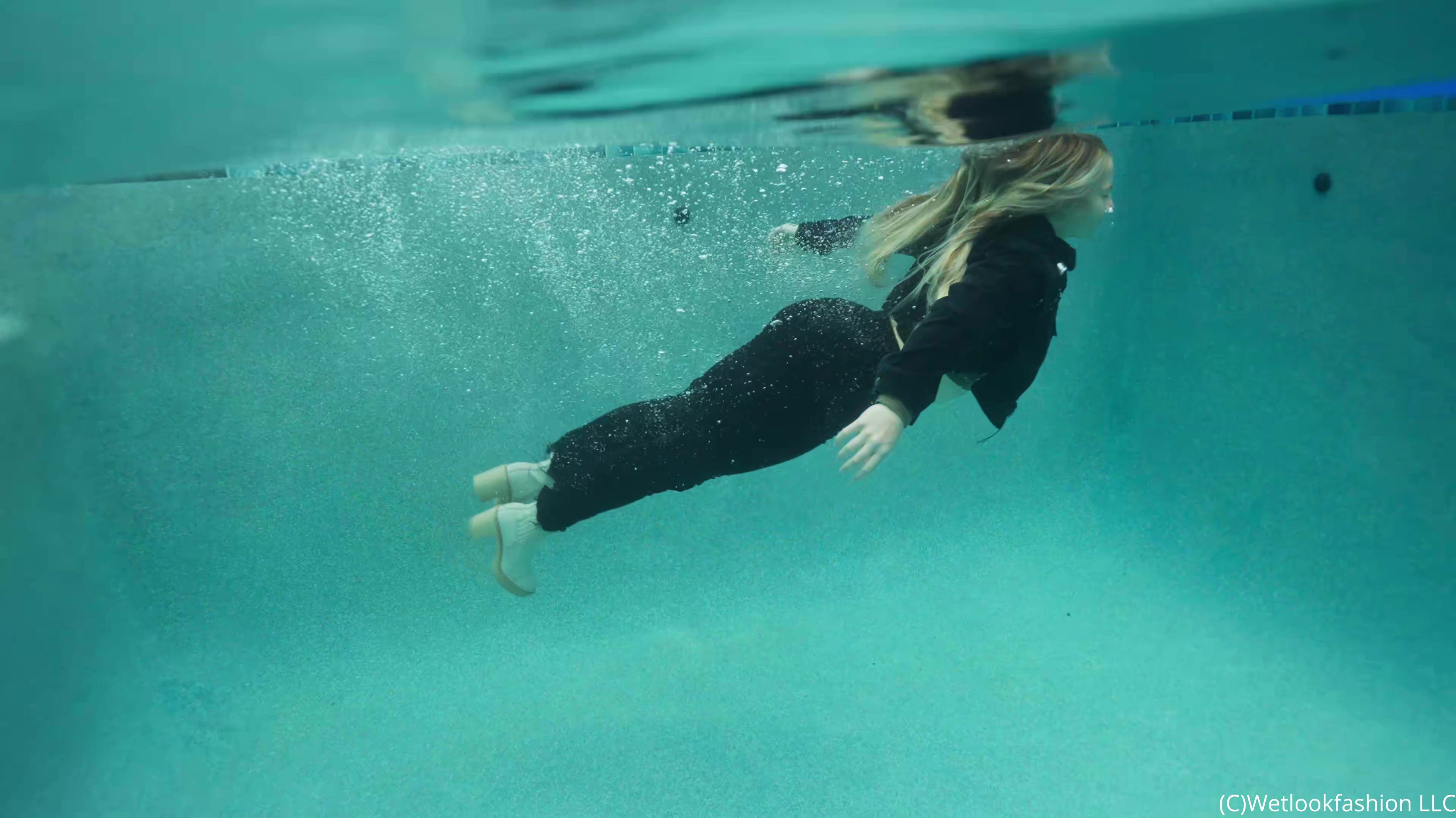 Brinley Gets Wet in All Black Denim