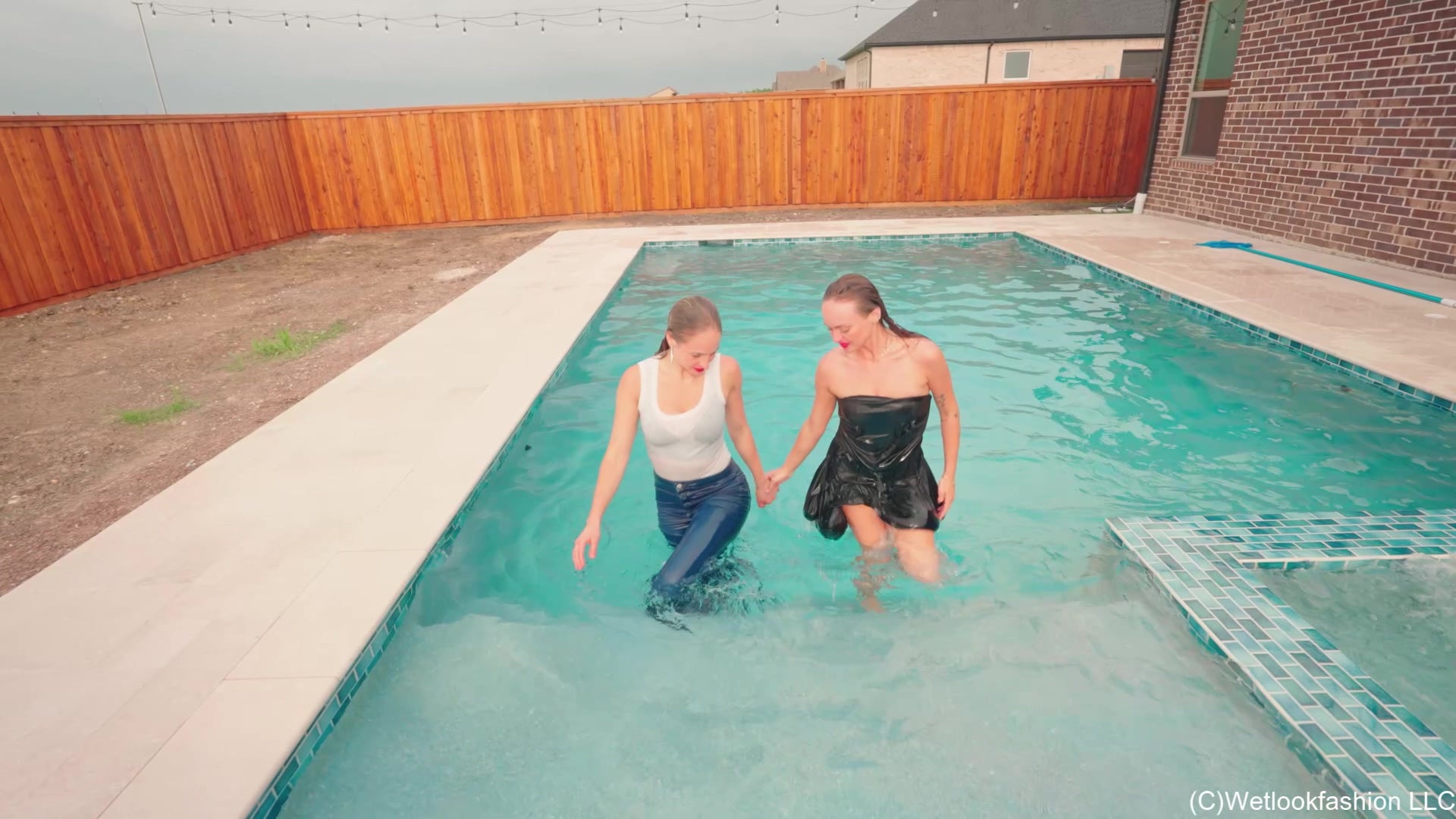 Camille and Tiffany Have a Clothed Pool Date