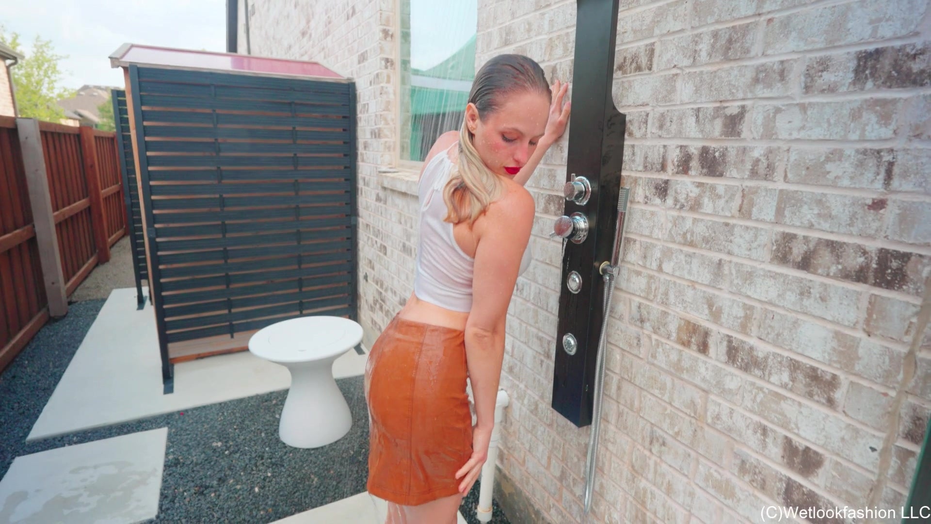 Camille Gets Wet in White and Leather