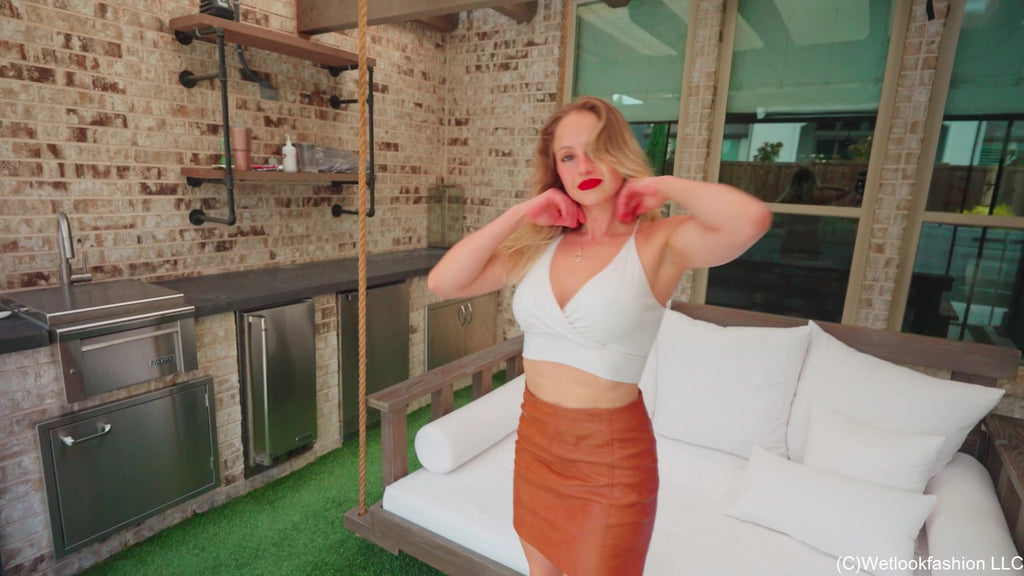 Camille Gets Wet in White and Leather