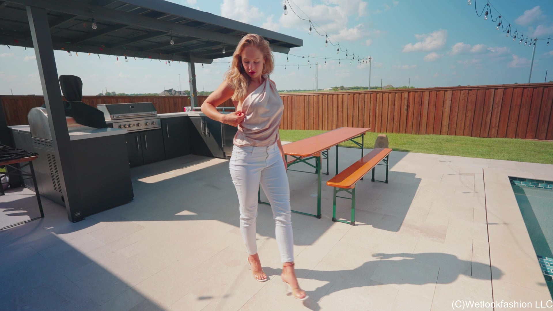 Camille Goes for a Swim in White Jeans and a Satin Top