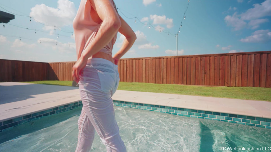 Camille Goes for a Swim in White Jeans and a Satin Top