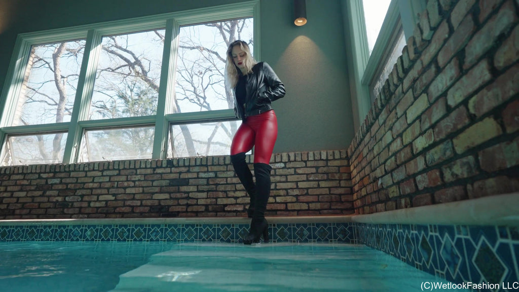 Camille in the Pool Wearing a Red and Black Leather Outfit