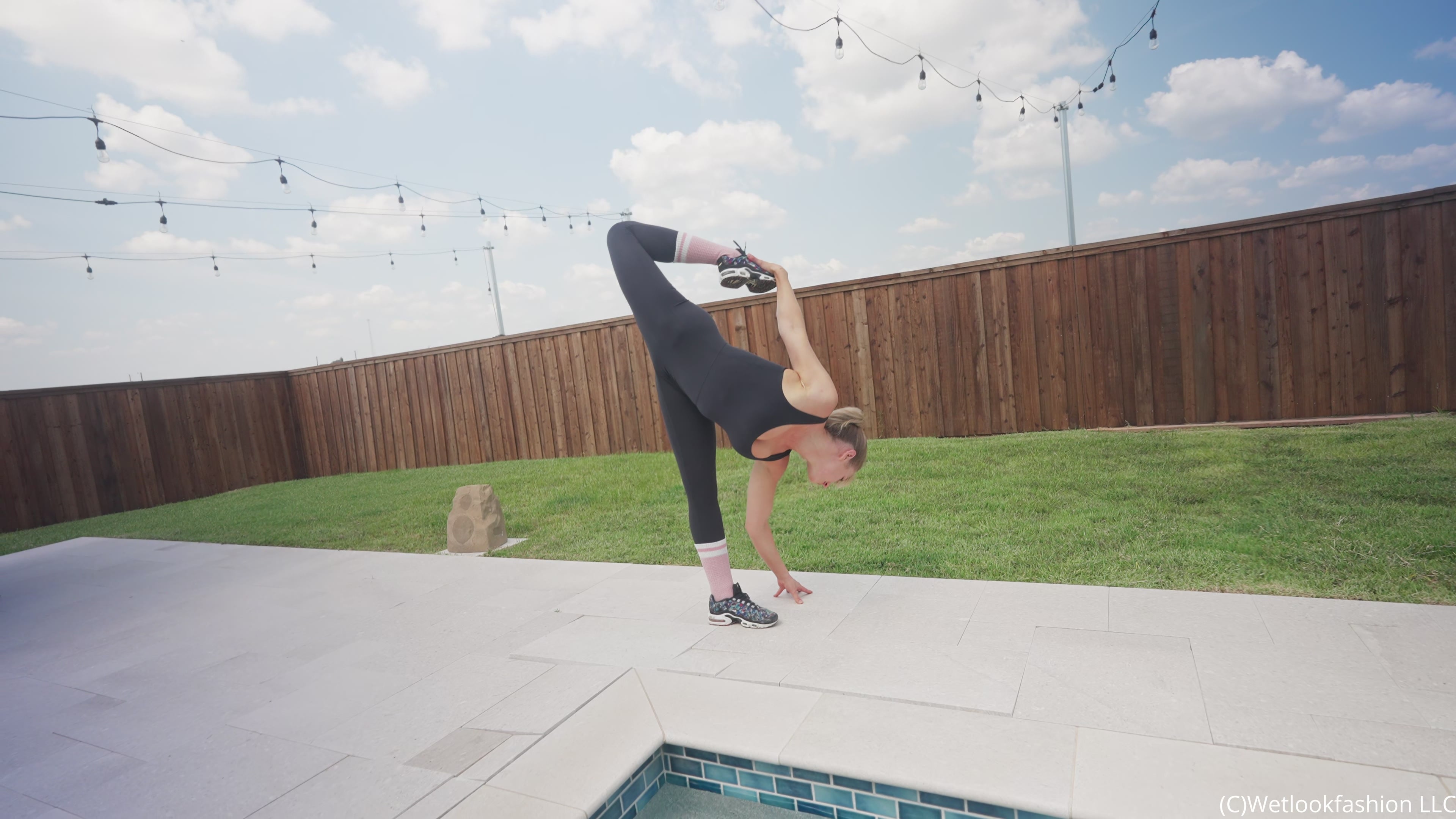 Camille Split Dives in the Pool Wearing a Hot Jumpsuit