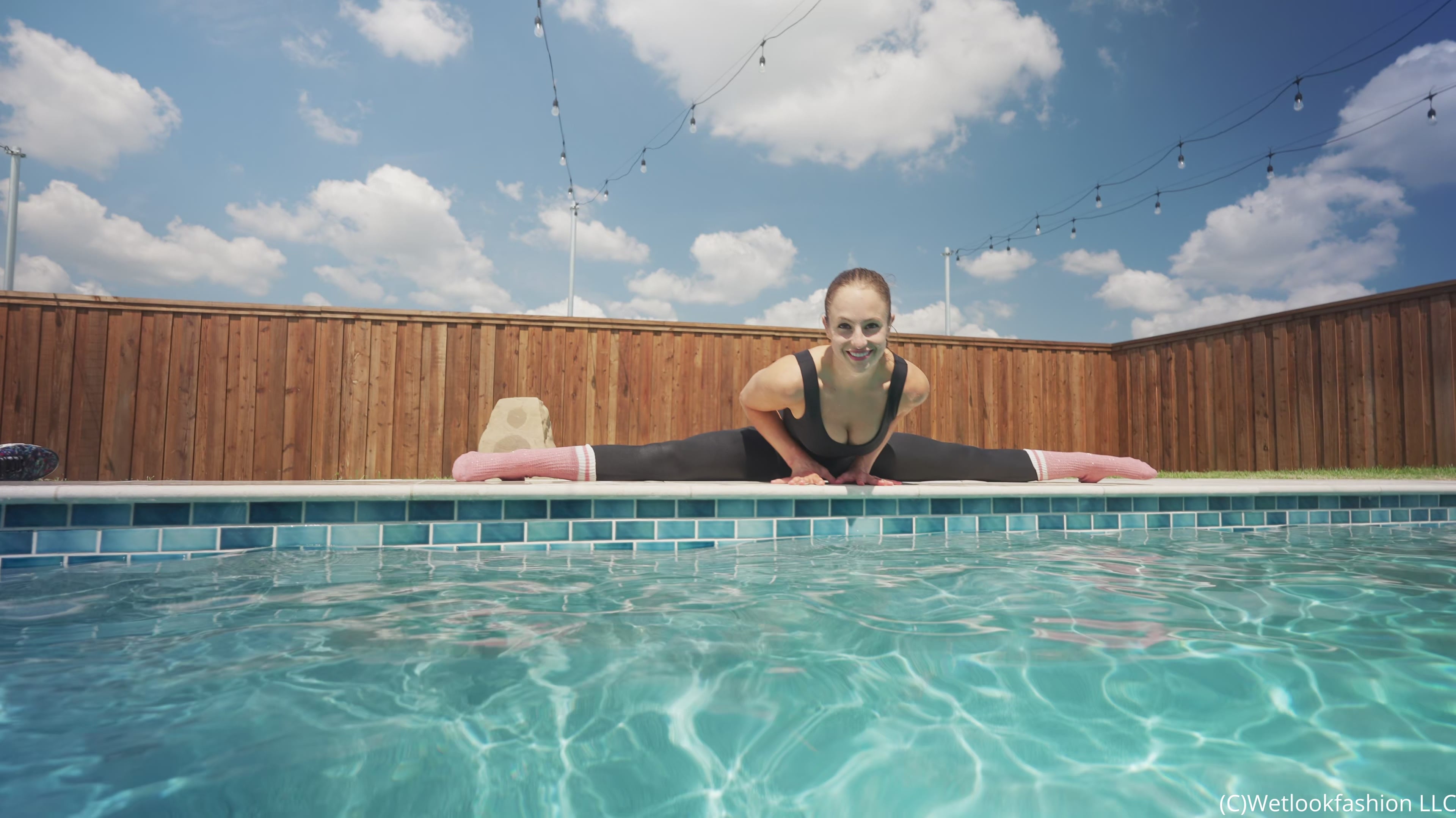Camille Split Dives in the Pool Wearing a Hot Jumpsuit
