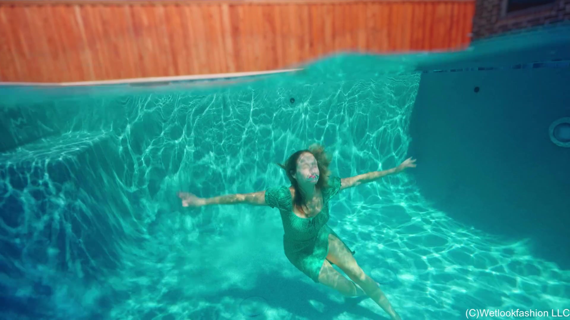 Camille Takes a Dip in a Summer Dress