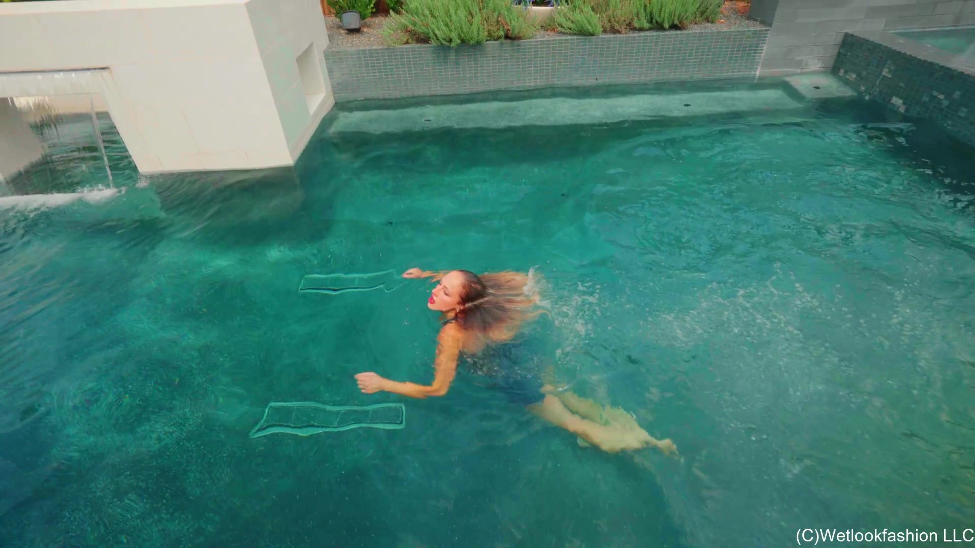 Camille Takes a Dip in Denim Dungarees