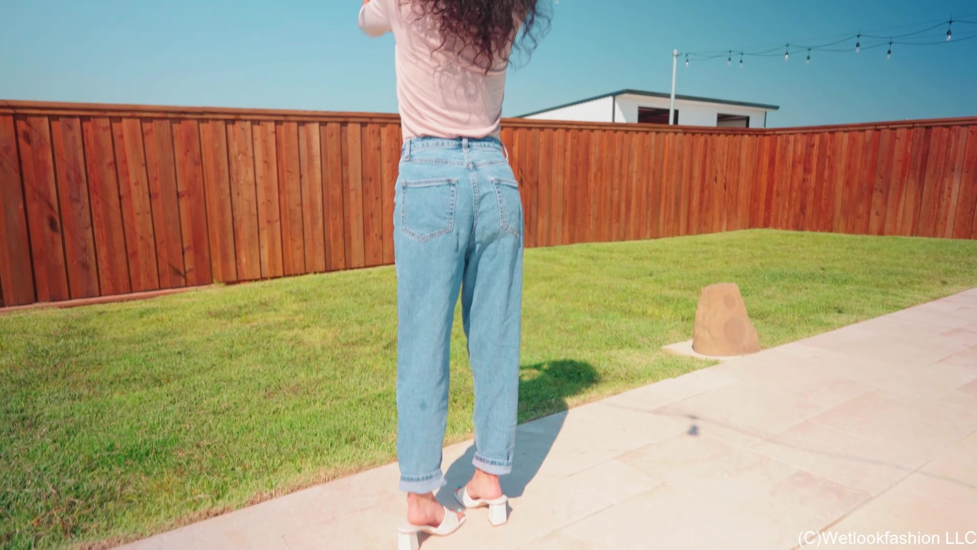 Carla Falls in the Pool Wearing Jeans and a Sheer Top